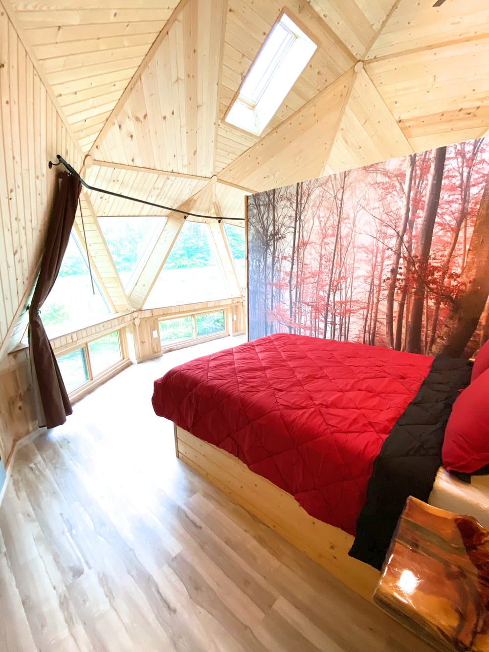 Bedroom inside the dome with a queen bed