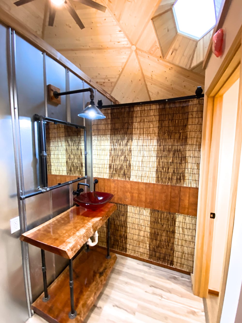 Bathroom vanity with a live-edge wood counter